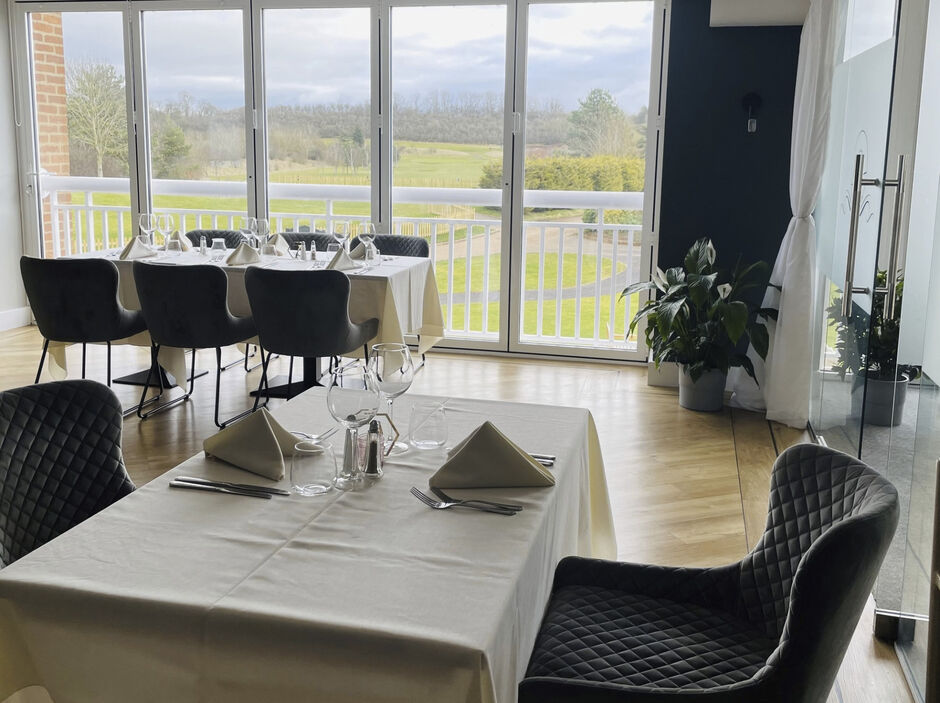 Interior of La Vista Restaurant with views over the golf course